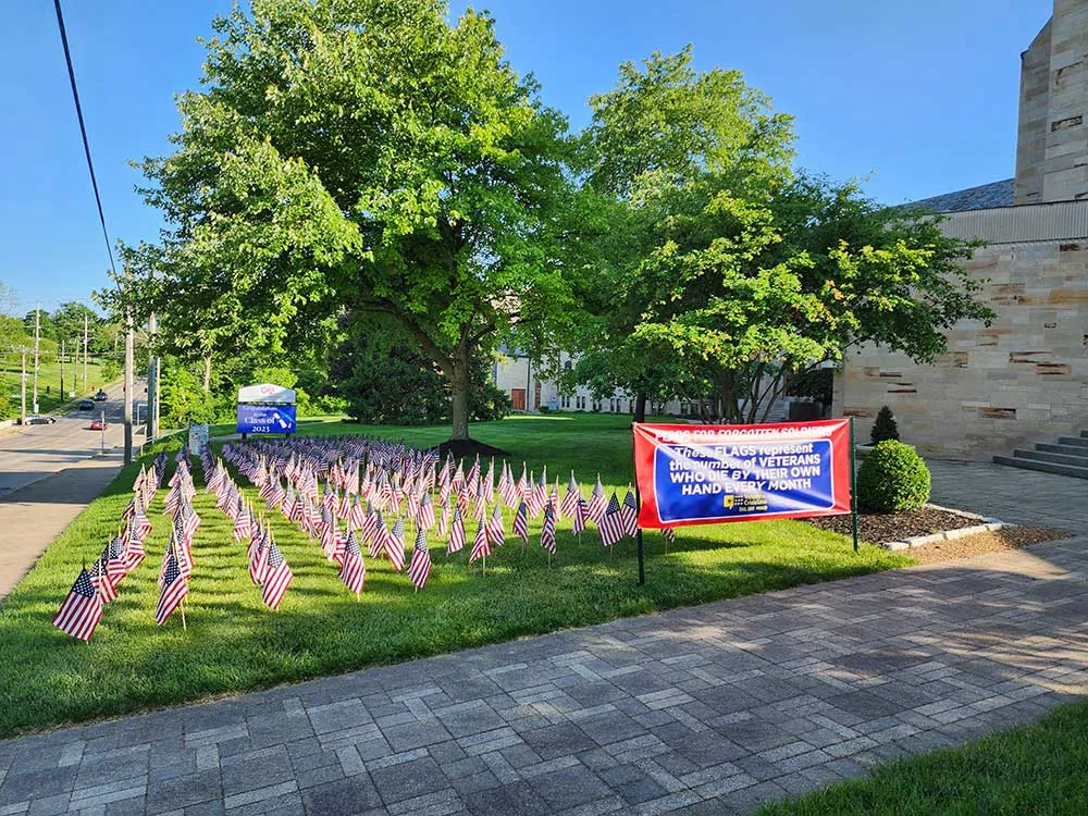 An American flag at a Memorial Day tribute — the kind of image that started this workshop.